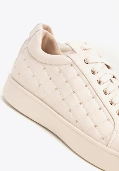 Damskie sneakersy skórzane z pikowaną cholewką kremowe><noscript><img data-lazyloaded=