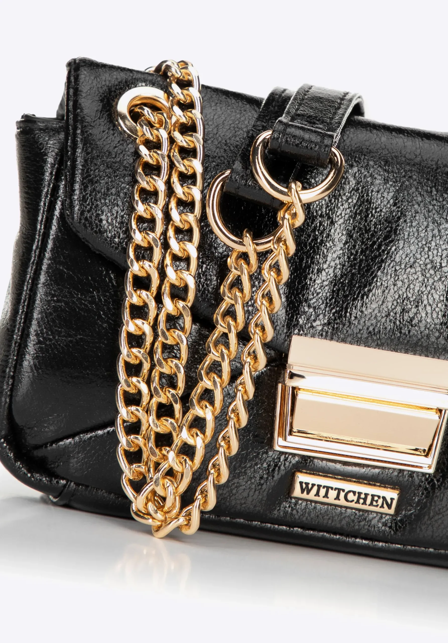 Minitorebka crossbody z połyskującej ekoskóry czarna>WITTCHEN New